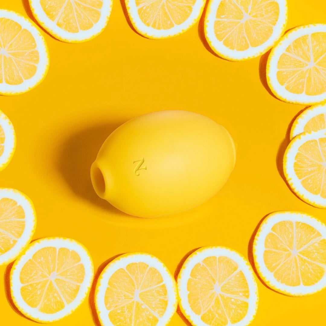 Hello Nancy's Lem product photographed on a bright yellow set with lemon slices
